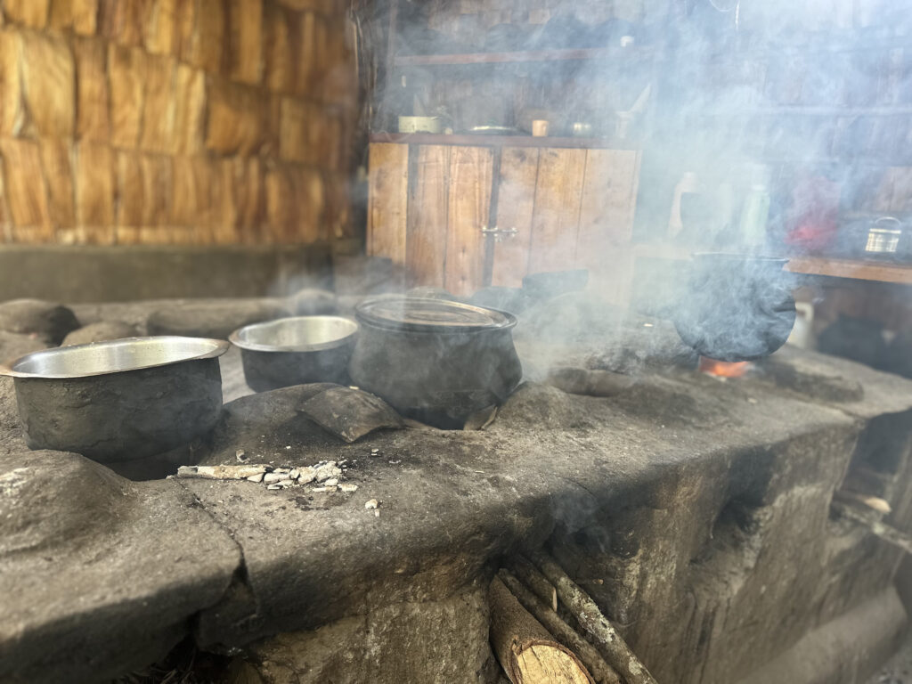 Open wood fire Open wood fire, surrounded by smoke, in rural Tanzania